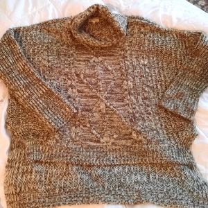 Very comfortable loose fitting sweater. Soft shade of green.